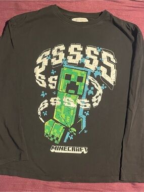 Zara Black Tee with White Pixel Graphic and Blue Accents